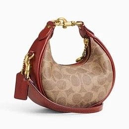 Coach Jonie Bag in Signature Canvas & Leather